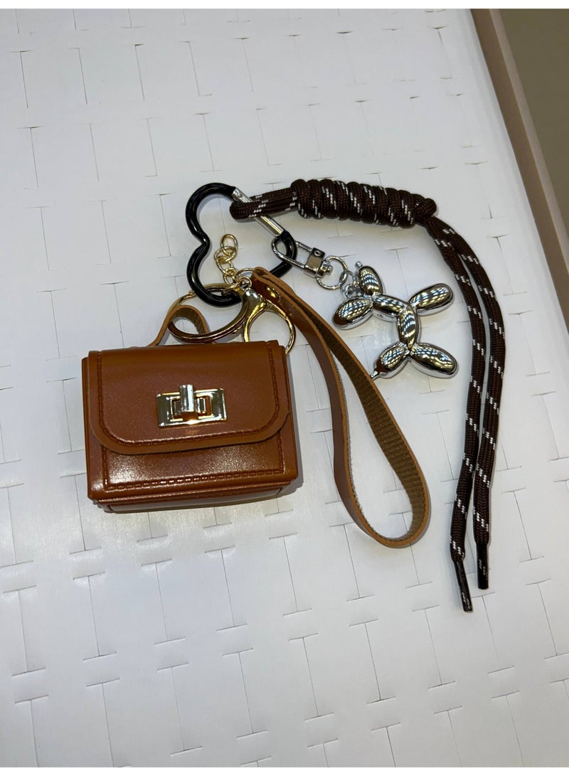 A stylish heart-shaped bag and keychains in assorted colors - Image 3